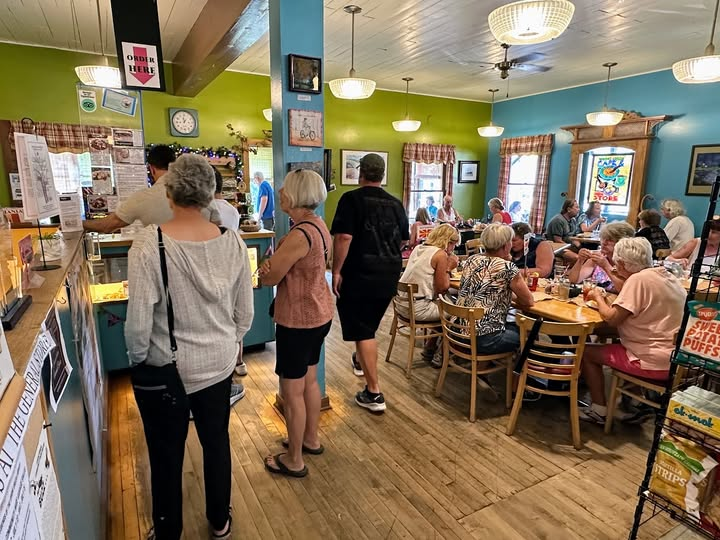 Locals and visitors enjoying the café at the Spring Green General Store cafe
